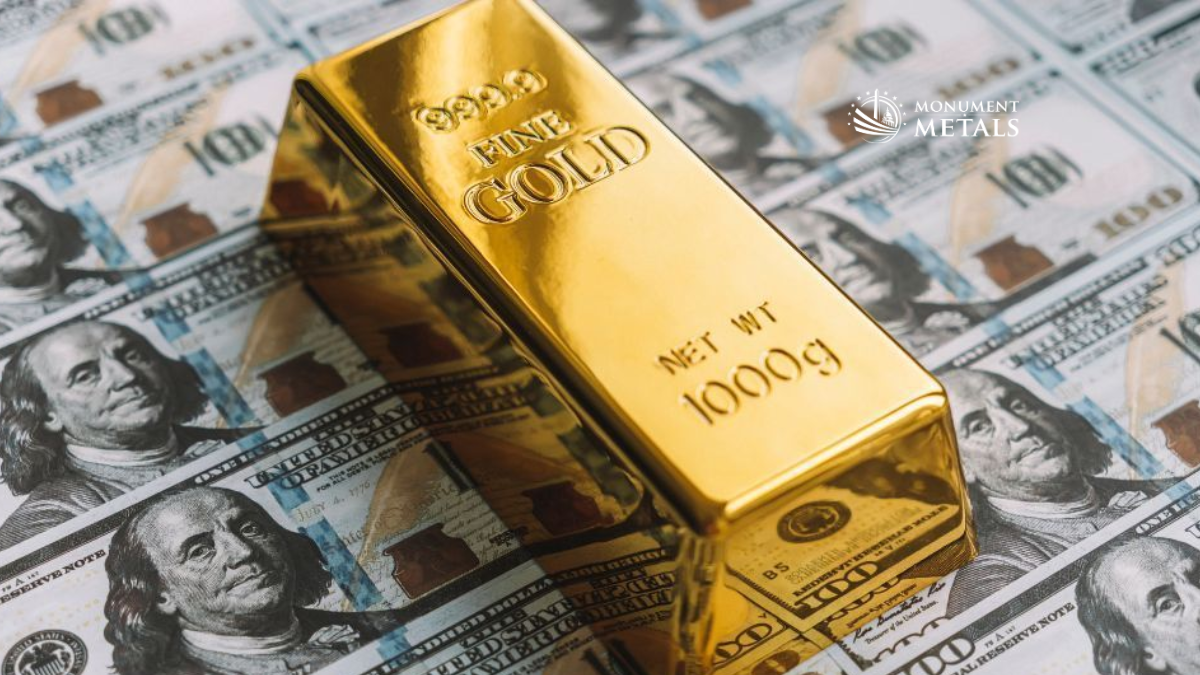 1 kilogram .9999 fine gold bar resting on a background of U.S. $100 bills, symbolizing wealth preservation and the relationship between gold and currency.