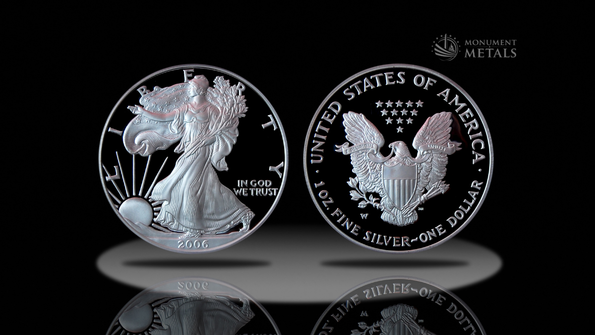 Two proof American Silver Eagles in black background