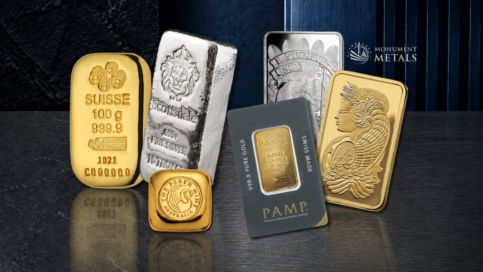 Assortment of cast and minted gold and silver bars displayed on a dark brushed-metal surface with subtle reflections.