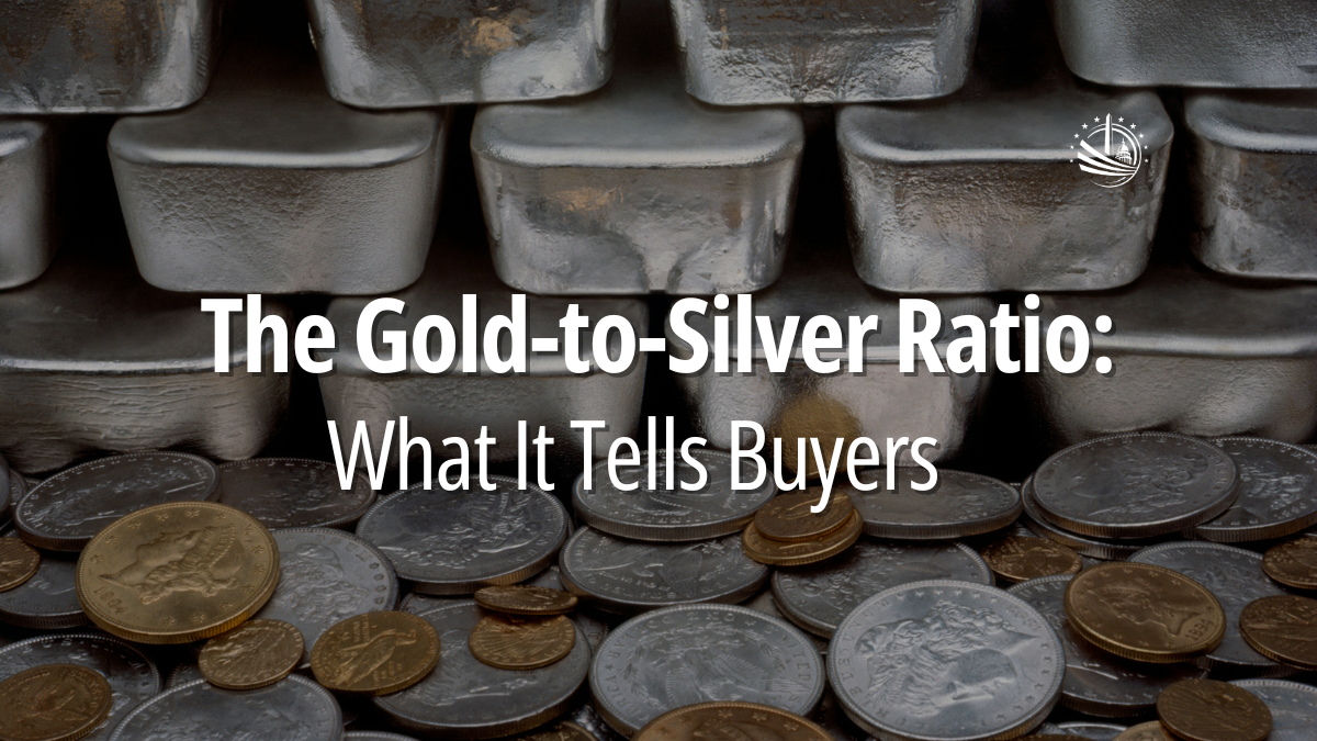Blog banner featuring stacked silver bars in the background with a spread of gold and silver coins in the foreground, overlaid with the title “The Gold-to-Silver Ratio: What It Tells Buyers” and a Monument Metals logo in the upper corner.