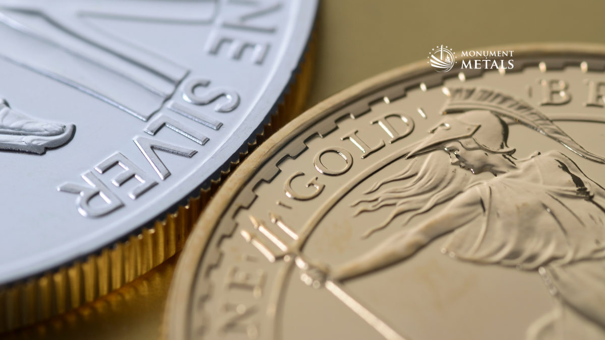 Macro close-up of gold and silver bullion coins showing detailed edges and design elements, highlighting precious metals liquidity and market recognition, with Monument Metals logo.
